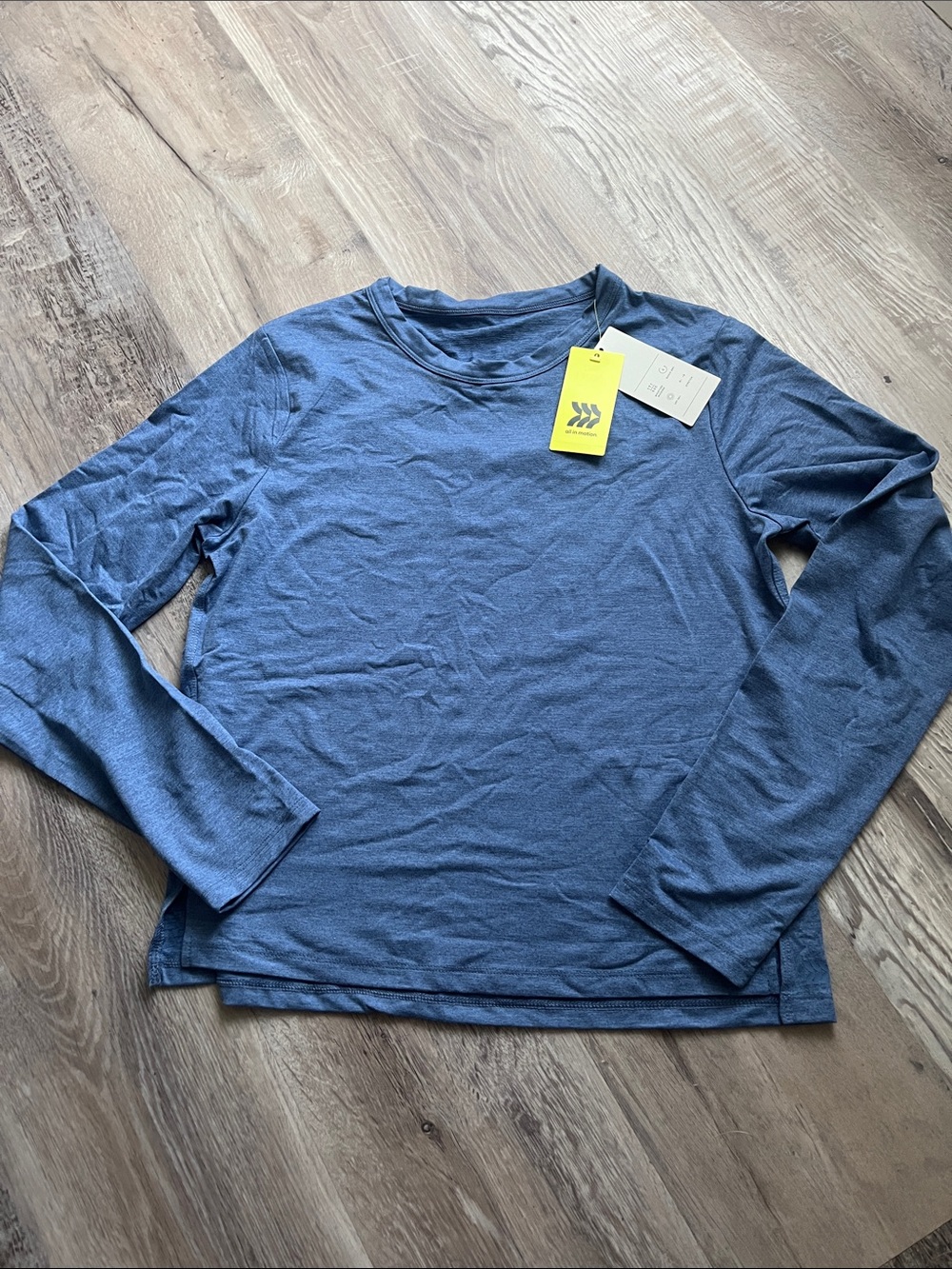 all in motion Women's Long Sleeve Crew Tee - Blue with keyhole back design